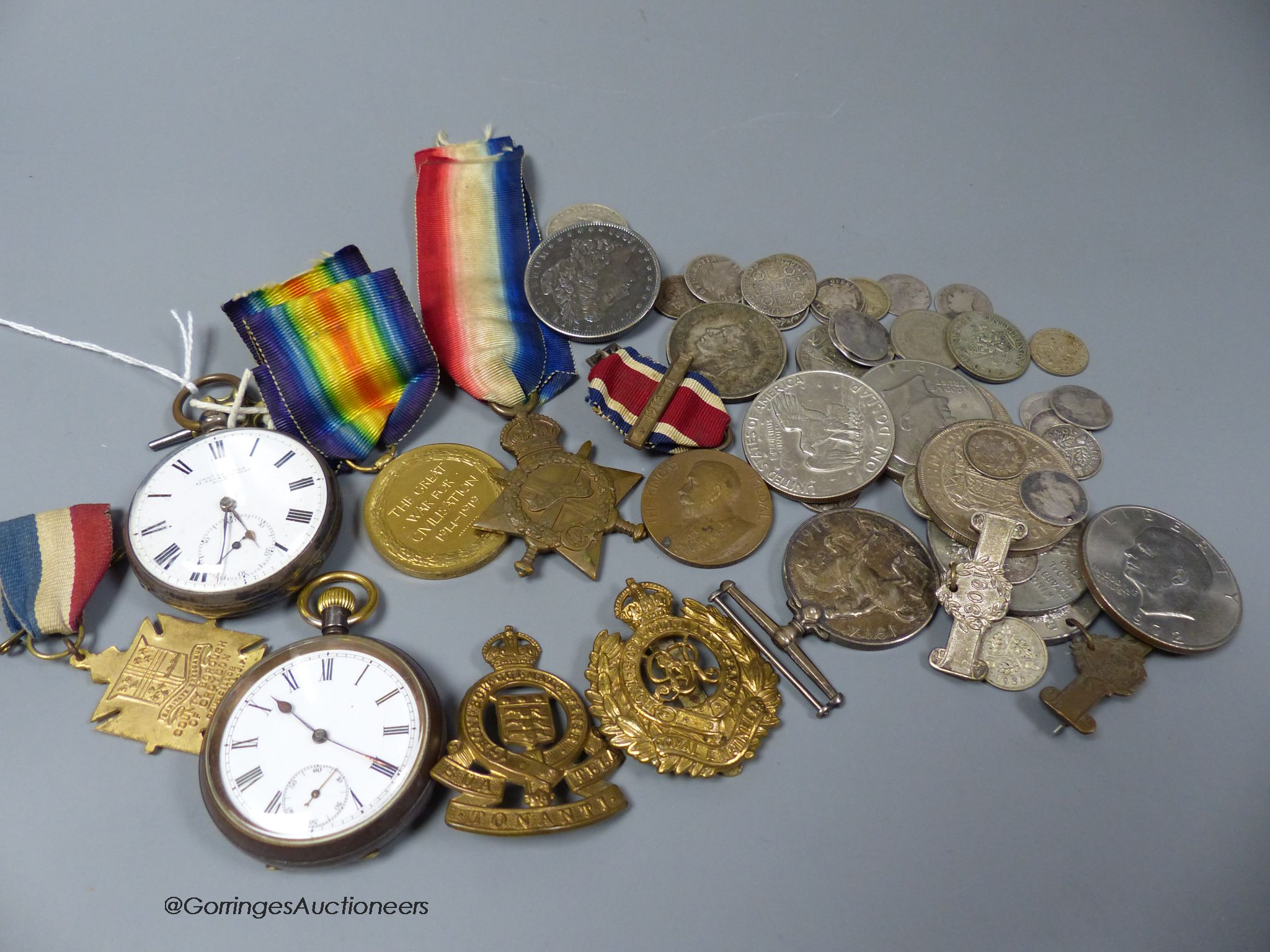 A 1562 shilling and other assorted coinage, two pocket watches and a group of mixed medals including a WWI trio.